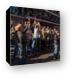 People on Bourbon Street trying to catch beads Canvas Print