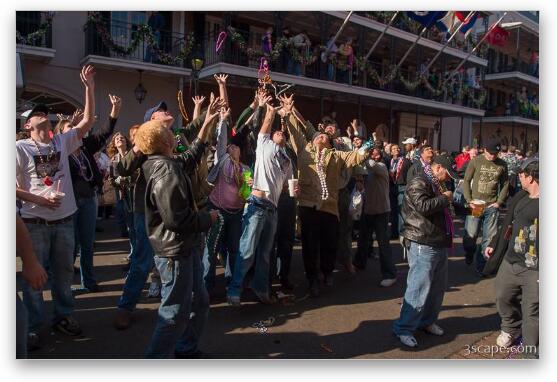 People on Bourbon Street trying to catch beads Fine Art Metal Print