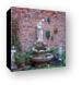 Fountain and sculptures tucked away in an alley Canvas Print