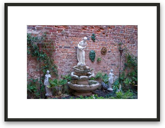 Fountain and sculptures tucked away in an alley Framed Fine Art Print