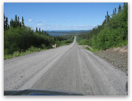 Endless gravel road with view of Manicouagan Reservoir Fine Art Print