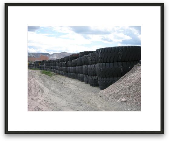 Huge truck tires from mining operation Framed Fine Art Print
