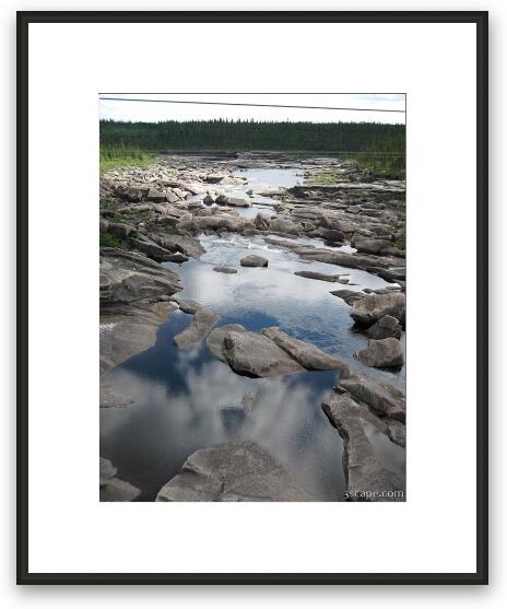 Reflections in still water and massive boulders Framed Fine Art Print
