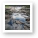 Reflections in still water and massive boulders Art Print