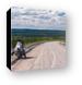 Motorcycling in the vast Canadian wilderness Canvas Print