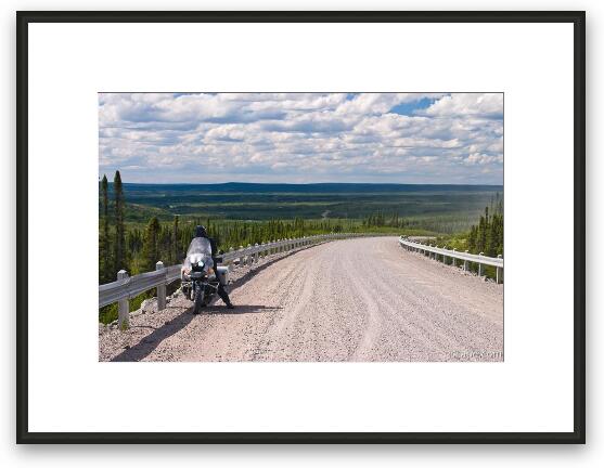 Motorcycling in the vast Canadian wilderness Framed Fine Art Print