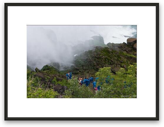 Tourists going down stairs to Cave of the Winds Framed Fine Art Print
