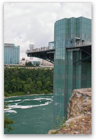Partial bridge over the river Fine Art Print