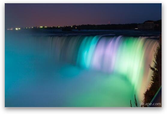 Colorful lights illuminating Niagara Falls Fine Art Print