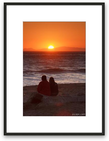 Two people enjoying the sunset at Tree at sunset, Leo Carrillo State Beach Framed Fine Art Print