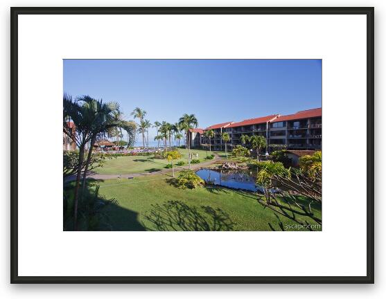 Papakea Resort grounds with view of the ocean Framed Fine Art Print
