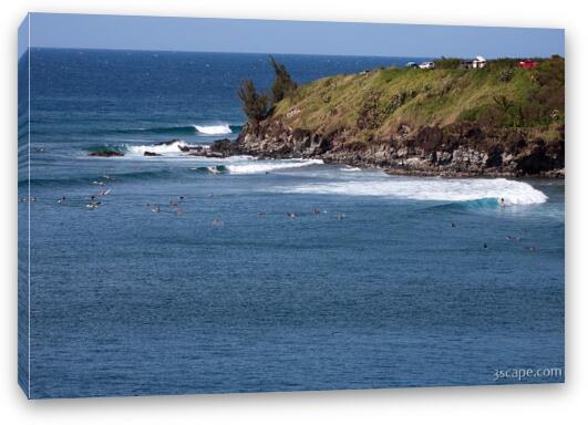Surfers near Honolua Fine Art Canvas Print