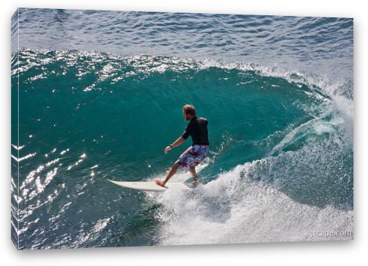 Surfer taking a wave near Honolua Fine Art Canvas Print