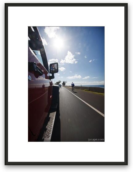 Bicycle rider on Maui highway Framed Fine Art Print