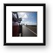 Bicycle rider on Maui highway Framed Print