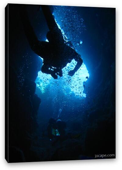 Scuba diving in swim-through Fine Art Canvas Print