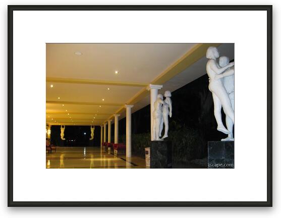 Hallway and statues at the resort Framed Fine Art Print