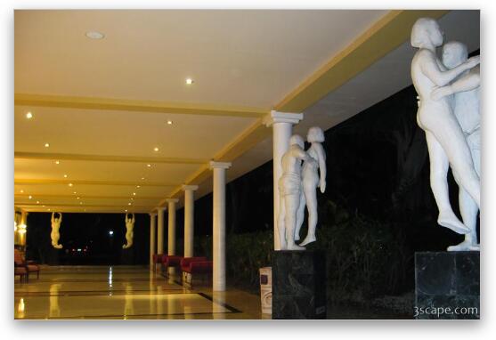 Hallway and statues at the resort Fine Art Metal Print