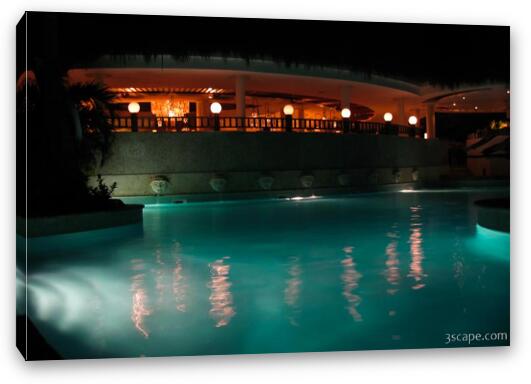 Night shot of VIP pool and restaurant Fine Art Canvas Print