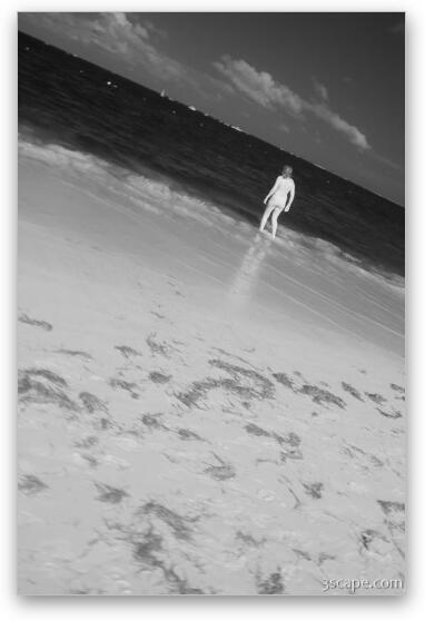 Woman wading in the water Fine Art Metal Print