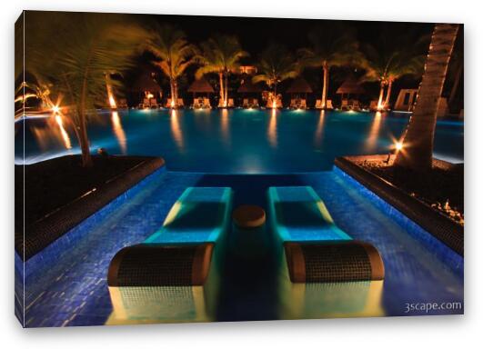 Night shot of the adult pool with sunken loungers Fine Art Canvas Print