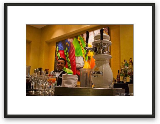 Bartender and fresh Corona on tap Framed Fine Art Print