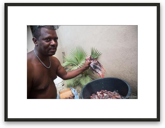 Local cleaning Lionfish at Sea Side Terrace Restaurant Framed Fine Art Print